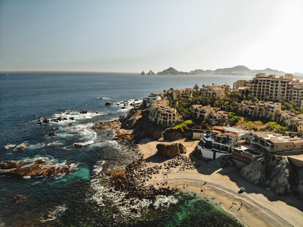 The Los Cabos coastline with a protected bay, with the arch formations in the distance